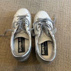 Golden Goose Super-star with silver heel tab and metal stud lettering